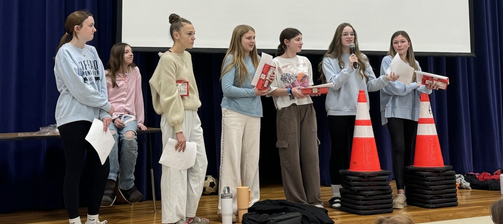 Christmas Spirit Week, Dec. 8th - 13th, Student Council members collected canned and packaged food donations. Whether it was canned goods, pasta, or rice, every single item donated made a big difference.   Each grade competed to donate the most food. It’s a time when we focus not just only on receiving, but on showing kindness and helping others. Our wonderful 5th graders have truly shown the spirit of Christmas by winning the contest. To celebrate, our Student Council members made a presentation to the entire 5th grade class. Each student received a candy cane and a heartfelt "thank-you" for thinking of others during this season of giving.