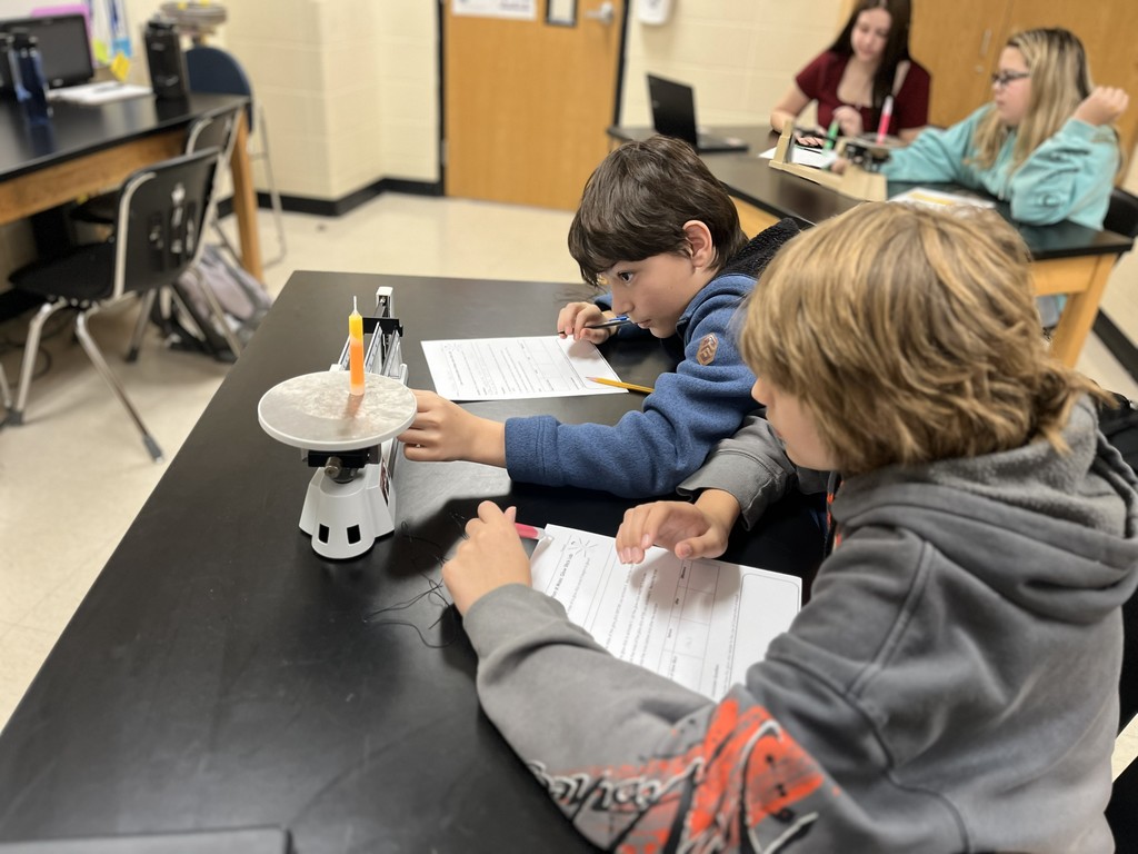 🔬✨ Science That Glows! ✨🔬  Mrs. Bryant’s class explored the Law of Conservation of Mass using glow sticks! When activated, a chemical reaction produced light—but the mass stayed the same before and after. 💡  Even though energy was released, no matter was created or destroyed—just rearranged! Science is truly glowing bright in this classroom! 💙💛  #HarrisonMiddleSchool #GreatGoblins #ScienceInAction #ConservationOfMass #GlowStickScience #HandsOnLearning