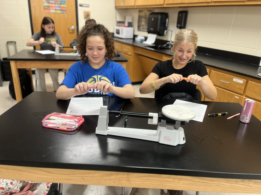 🔬✨ Science That Glows! ✨🔬  Mrs. Bryant’s class explored the Law of Conservation of Mass using glow sticks! When activated, a chemical reaction produced light—but the mass stayed the same before and after. 💡  Even though energy was released, no matter was created or destroyed—just rearranged! Science is truly glowing bright in this classroom! 💙💛  #HarrisonMiddleSchool #GreatGoblins #ScienceInAction #ConservationOfMass #GlowStickScience #HandsOnLearning
