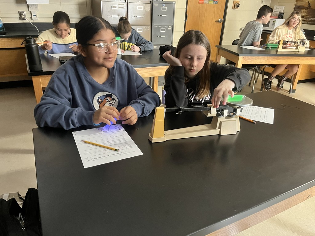 🔬✨ Science That Glows! ✨🔬  Mrs. Bryant’s class explored the Law of Conservation of Mass using glow sticks! When activated, a chemical reaction produced light—but the mass stayed the same before and after. 💡  Even though energy was released, no matter was created or destroyed—just rearranged! Science is truly glowing bright in this classroom! 💙💛  #HarrisonMiddleSchool #GreatGoblins #ScienceInAction #ConservationOfMass #GlowStickScience #HandsOnLearning