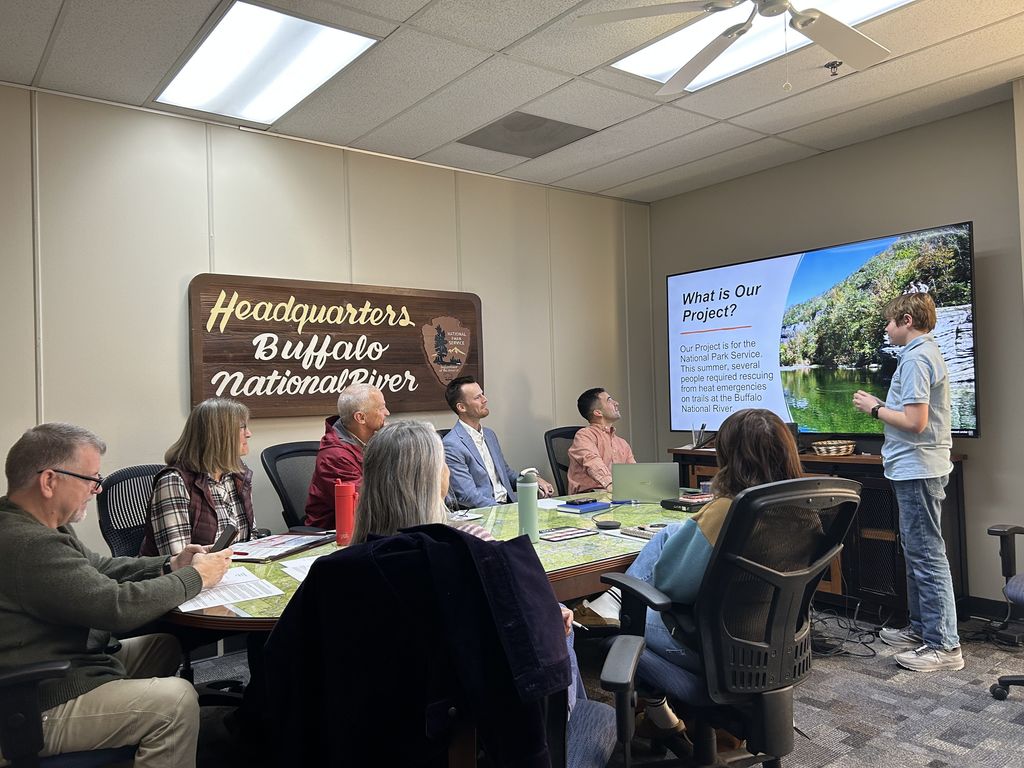 🌲👏 EAST Student Spotlight! EAST student Boone Mays recently presented his team’s project idea to the Buffalo River Partners. Their project, Trailblazer’s Guide, is designed to improve hiker safety by installing a temperature-display sign at a Buffalo River trailhead—helping alert hikers to the dangers of extreme heat. ☀️🥾  We’re excited to share that Boone’s team received $3,000 in funding from the Buffalo River Partners to help bring this project to life!  Team members include Bronson Vansandt, Freddie Peoples, and Cole Wray. Great work turning innovation into real-world impact!  #EASTInitiative #StudentInnovation #CommunityPartners #BuffaloRiver #STEMInAction #TrailSafety