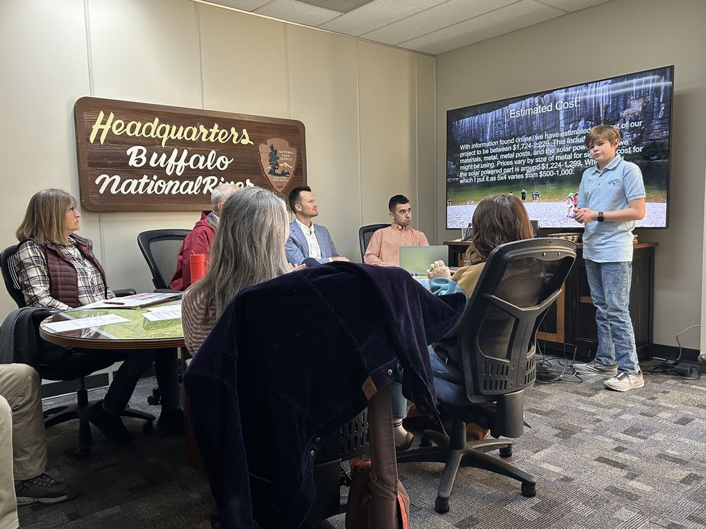 🌲👏 EAST Student Spotlight! EAST student Boone Mays recently presented his team’s project idea to the Buffalo River Partners. Their project, Trailblazer’s Guide, is designed to improve hiker safety by installing a temperature-display sign at a Buffalo River trailhead—helping alert hikers to the dangers of extreme heat. ☀️🥾  We’re excited to share that Boone’s team received $3,000 in funding from the Buffalo River Partners to help bring this project to life!  Team members include Bronson Vansandt, Freddie Peoples, and Cole Wray. Great work turning innovation into real-world impact!  #EASTInitiative #StudentInnovation #CommunityPartners #BuffaloRiver #STEMInAction #TrailSafety