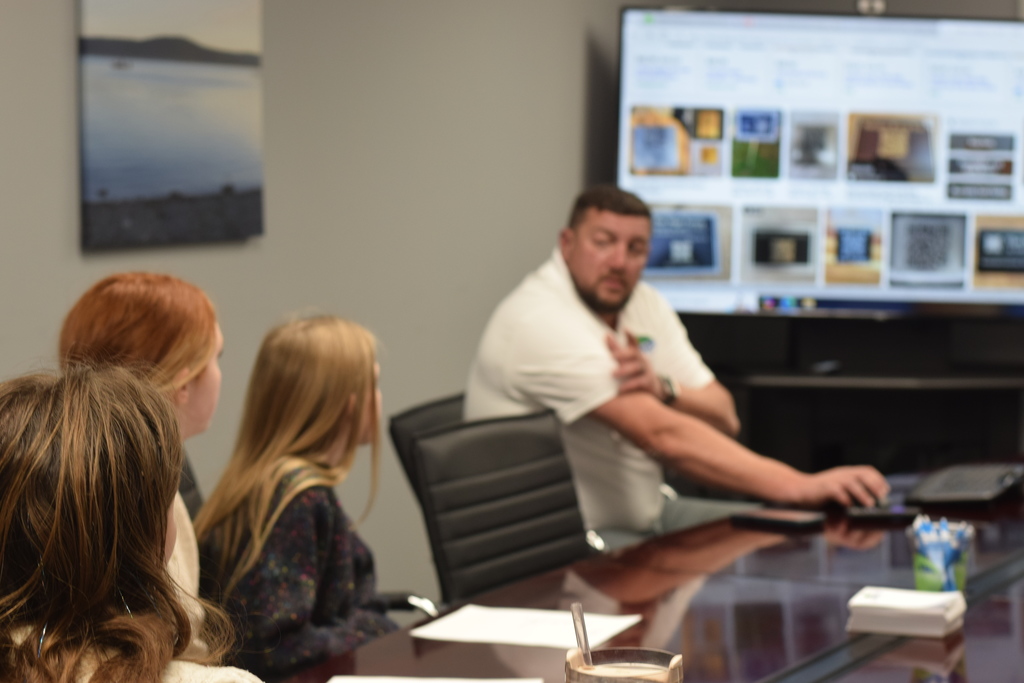 🎨📱 Mural Tech in Action! Students working on the EAST Project Mural Tech partnered with Explore Harrison’s Matt Bell for a productive day in Downtown Harrison. During a guided walking tour of the city’s murals, students collaborated with Mr. Bell to plan Phase 1 of the project—adding plaques with QR codes and informative details to each mural.  It was a beautiful day to learn, collaborate, and connect art with technology! A big thank-you to Matt Bell for sharing his time and expertise, and to Boba Joe’s for the treats that made the day even sweeter.  #EASTProject #MuralTech #ExploreHarrisonAR #DowntownHarrison #StudentCollaboration #ArtMeetsTechnology #CommunityPartnership #LearningBeyondTheClassroom #QRinAction #ThankYou