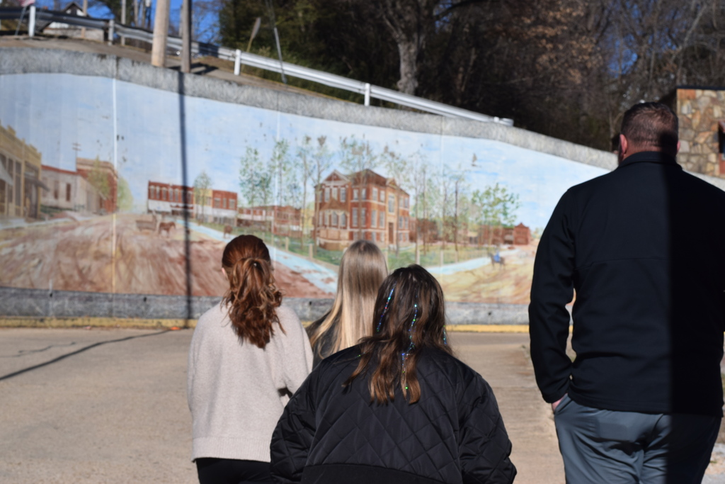 🎨📱 Mural Tech in Action! Students working on the EAST Project Mural Tech partnered with Explore Harrison’s Matt Bell for a productive day in Downtown Harrison. During a guided walking tour of the city’s murals, students collaborated with Mr. Bell to plan Phase 1 of the project—adding plaques with QR codes and informative details to each mural.  It was a beautiful day to learn, collaborate, and connect art with technology! A big thank-you to Matt Bell for sharing his time and expertise, and to Boba Joe’s for the treats that made the day even sweeter.  #EASTProject #MuralTech #ExploreHarrisonAR #DowntownHarrison #StudentCollaboration #ArtMeetsTechnology #CommunityPartnership #LearningBeyondTheClassroom #QRinAction #ThankYou