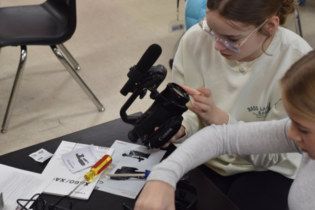 Let’s hear it for the girls! 👏🎉 Madalyn, Elayna, and Annabelle are hard at work assembling and testing out our brand-new video camera and all of its accessories.  Thanks to an EAST Upgrade Grant, our EAST@HMS program was able to purchase this exciting new equipment! EAST students are already eager to put the camera to use—documenting their projects, capturing their learning, and creating new videos to showcase their hard work and creativity.  #EASTatHMS #GirlPower #StudentsInAction #EASTProgram #UpgradeGrant #TechInTheClassroom #StudentCreators #LearningByDoing #FutureLeaders #HandsOnLearning