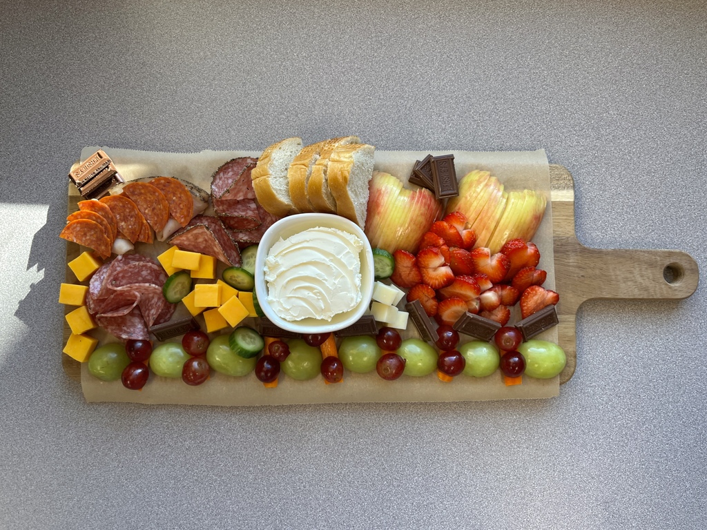 From playdough to professional platters! 🔪🧀  Our 8th-grade Menu Adventure students just wrapped up a two-week knife skills unit that was a total cut above the rest!  After perfecting their technical knife skills using student-made playdough, these young chefs stepped into the kitchen lab to master the real deal. The grand finale? A high-stakes Charcuterie Challenge where students created stunning displays of meats, cheeses, and fruits.  The best part — our school staff served as official judges, casting votes for their favorite boards based on presentation and technique. It was easily one of the most popular (and delicious!) assignments of the year!  We are so proud of the focus, creativity, and teamwork these students brought to the kitchen! 👏✨  #MenuAdventure #CTE #FutureChefs #KnifeSkills #CharcuterieChallenge #HandsOnLearning #MiddleSchoolMagic #StudentSuccess