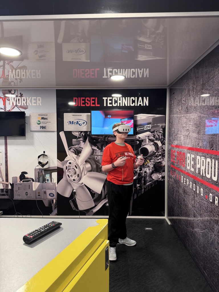 Exploring Futures with Be Pro Be Proud! 🚛✨  HMS 8th grade students recently had an exciting, hands-on experience with the Be Pro Be Proud Mobile Workshop! Students explored a variety of high-demand career pathways while getting to operate cutting-edge, high-tech simulators.  Our student ambassadors did an amazing job stepping into leadership roles—training their peers and helping guide them through each experience! 👏  Be Pro Be Proud, Inc. is leading the movement to inspire a new generation of pride, progress, and opportunity in America’s skilled workforce—and our students got a firsthand look at what their futures could hold!  #BeProBeProud #FutureReady #HMSPride #CareerExploration