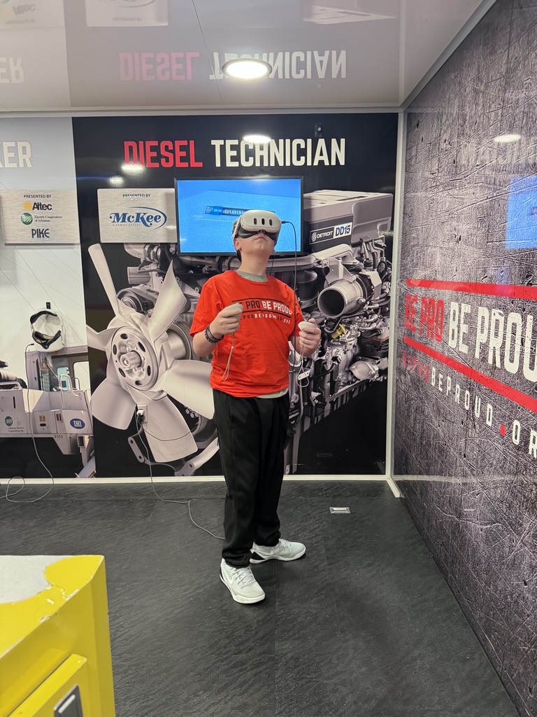 Exploring Futures with Be Pro Be Proud! 🚛✨  HMS 8th grade students recently had an exciting, hands-on experience with the Be Pro Be Proud Mobile Workshop! Students explored a variety of high-demand career pathways while getting to operate cutting-edge, high-tech simulators.  Our student ambassadors did an amazing job stepping into leadership roles—training their peers and helping guide them through each experience! 👏  Be Pro Be Proud, Inc. is leading the movement to inspire a new generation of pride, progress, and opportunity in America’s skilled workforce—and our students got a firsthand look at what their futures could hold!  #BeProBeProud #FutureReady #HMSPride #CareerExploration