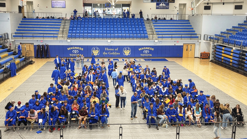 seniors seated in arena