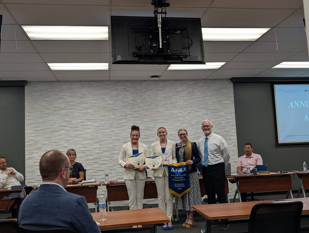HMS students, staff, and admin receiving recognition for National award.