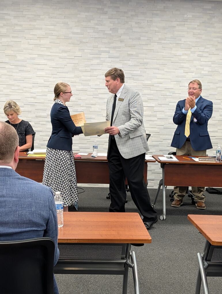 Molly Thurman receiving recognition for her state awards.