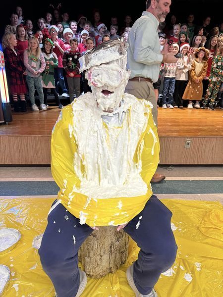 Coach pie in the face