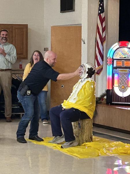 Coach pie in the face