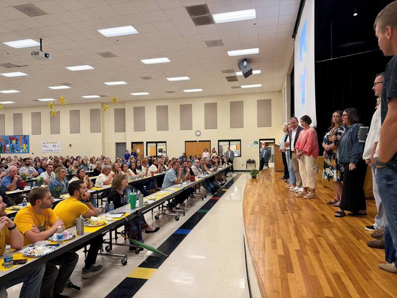 parents speaking to staff