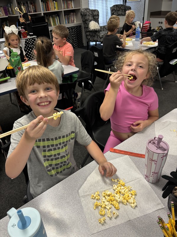 student with chopsticks