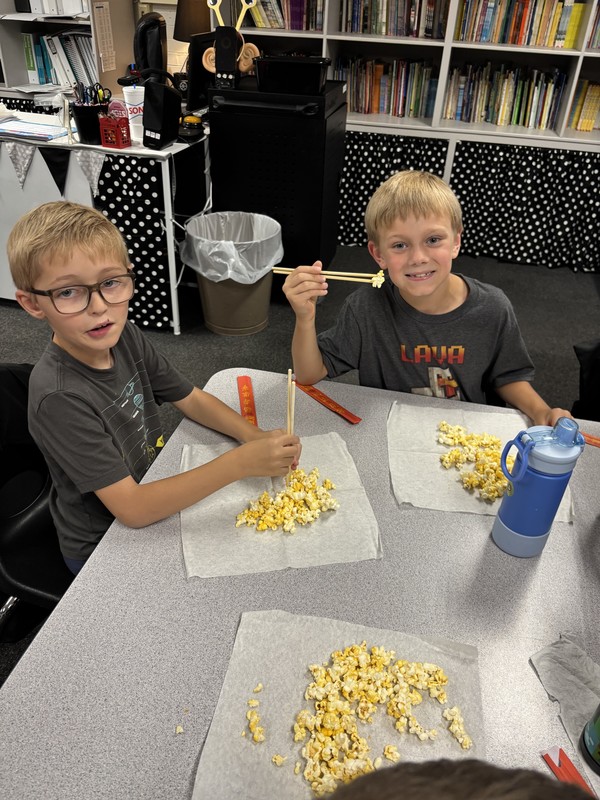 student with chopsticks