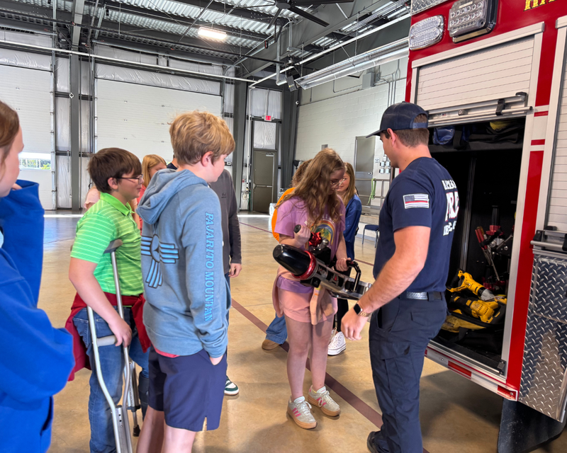 students with fireman