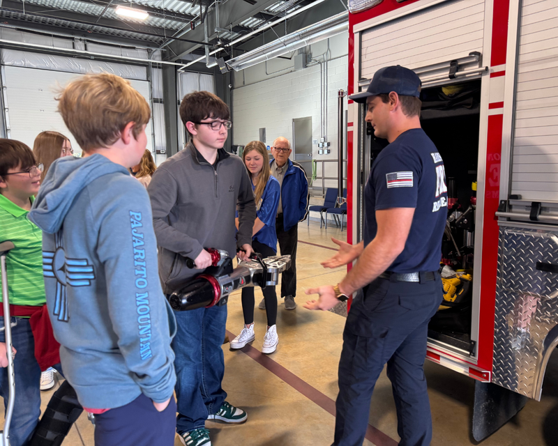 students with fireman