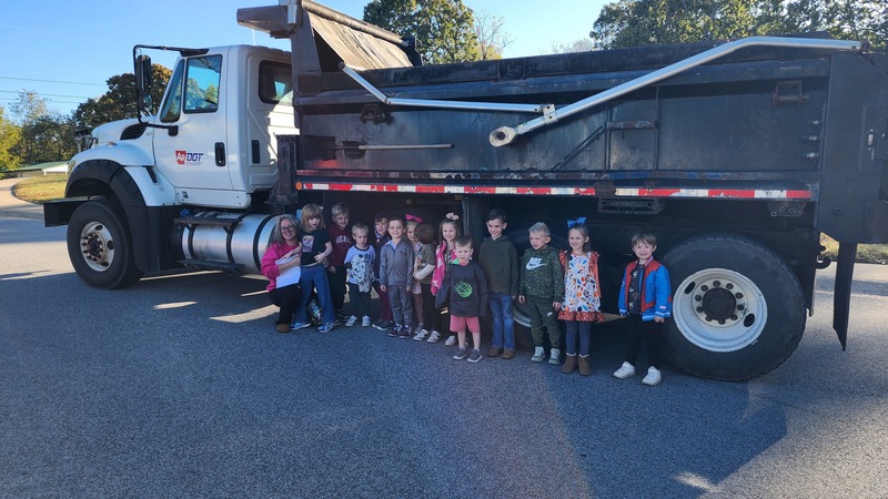 Students in front of ARDOT dump truck