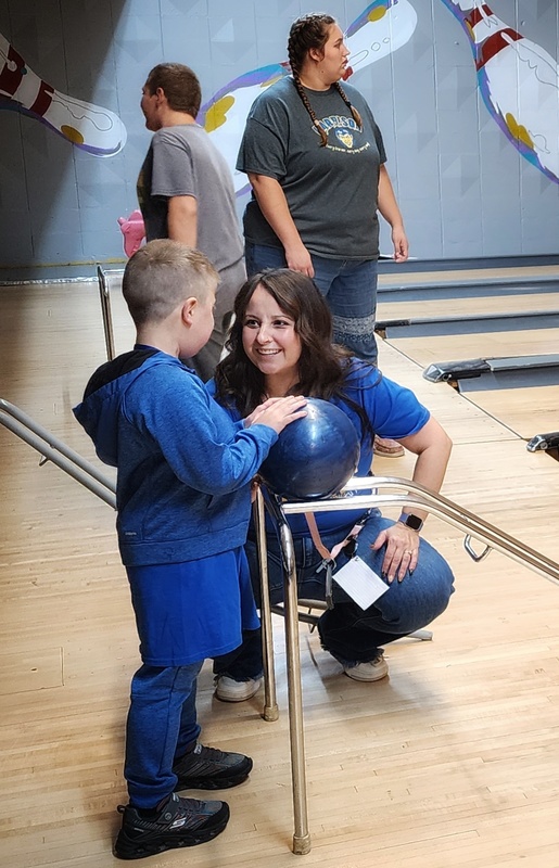 students at bowling alley