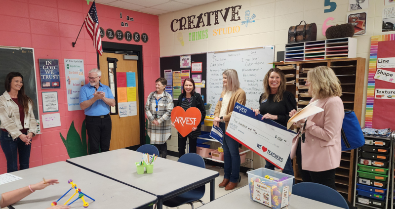 Arvest Team surprising teacher