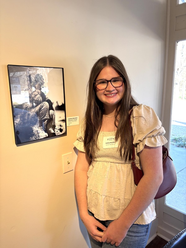 student with artwork