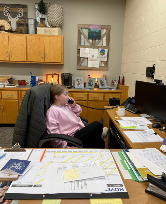 Callie at the principal's desk