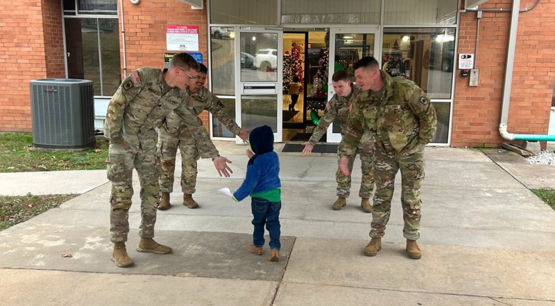 National Guard members greet students