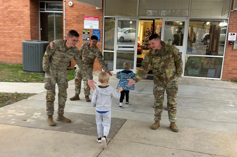 National Guard members greet students