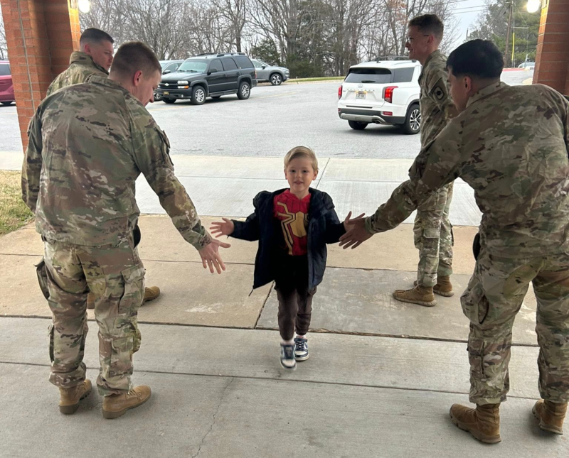 National Guard members greet students