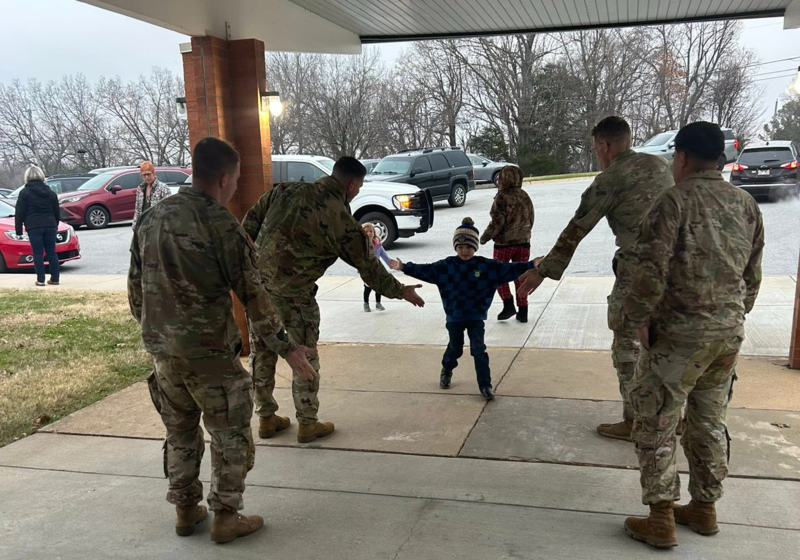 National Guard members greet students