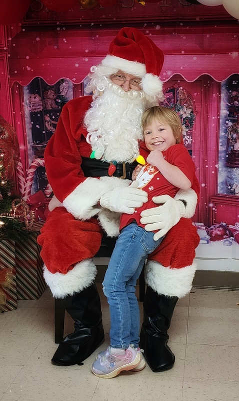 student with Santa