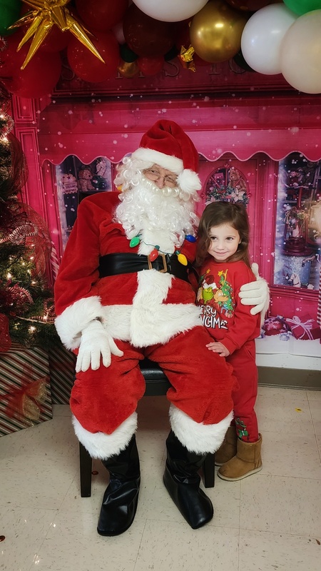 student with Santa