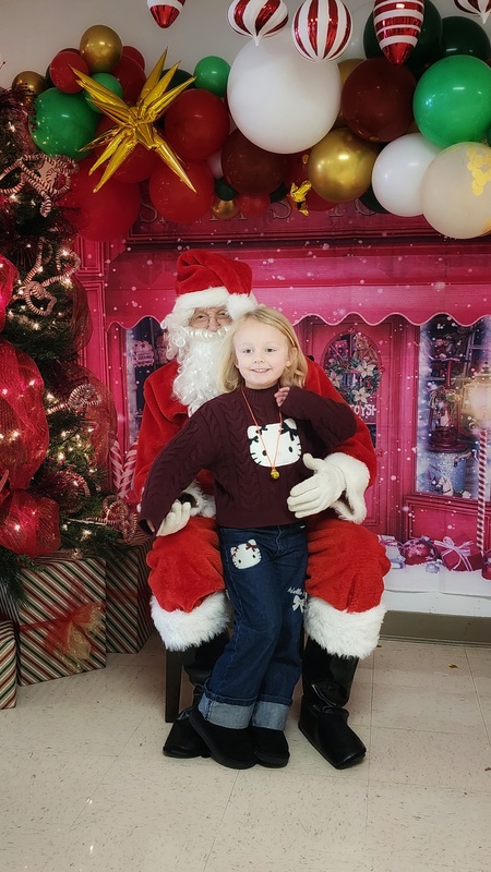 student with Santa