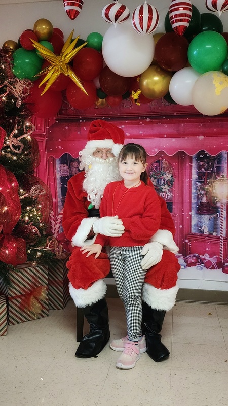 student with Santa