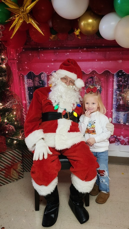 student with Santa