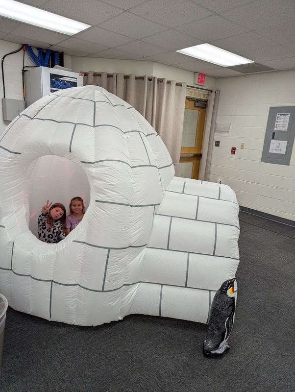 children inside igloo