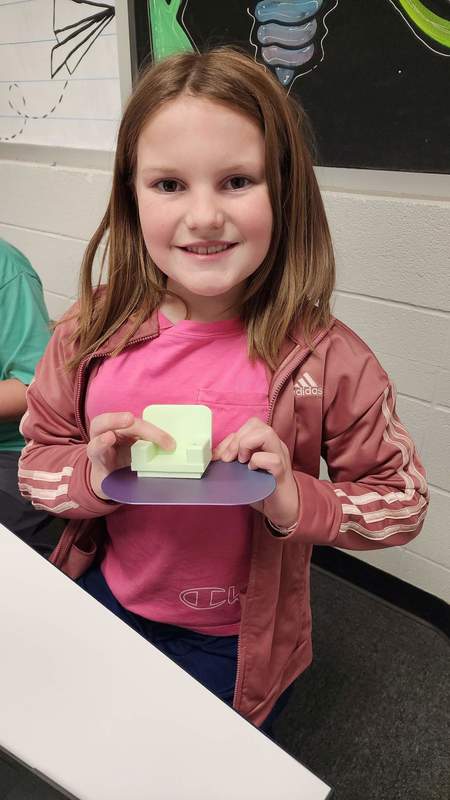 student with furniture