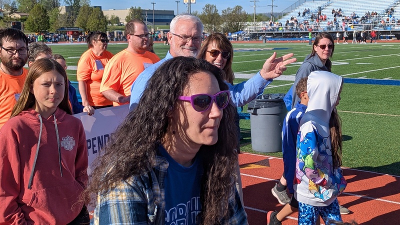 Special Olympians walking track