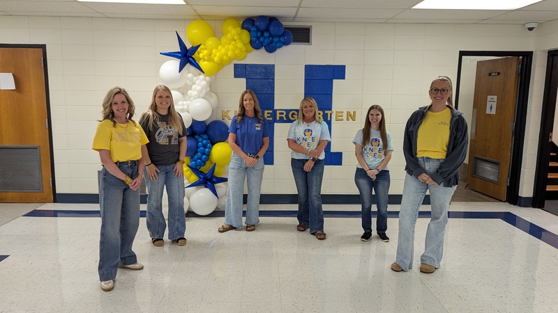 Kindergarten staff welcoming guests
