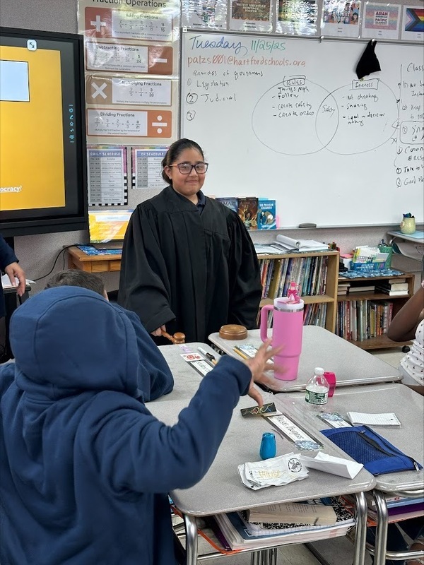 Kennelly Students don the judge's robes
