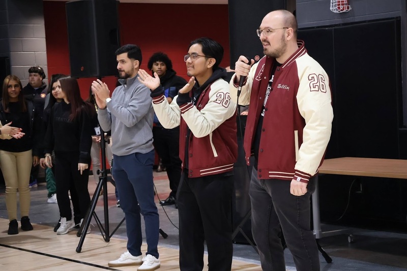 Student Council President and teacher at the pep rally