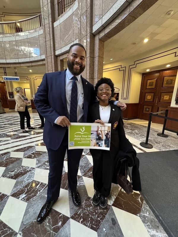 Dr. Andraé Townsel with Bulkeley senior Micquandre Wright