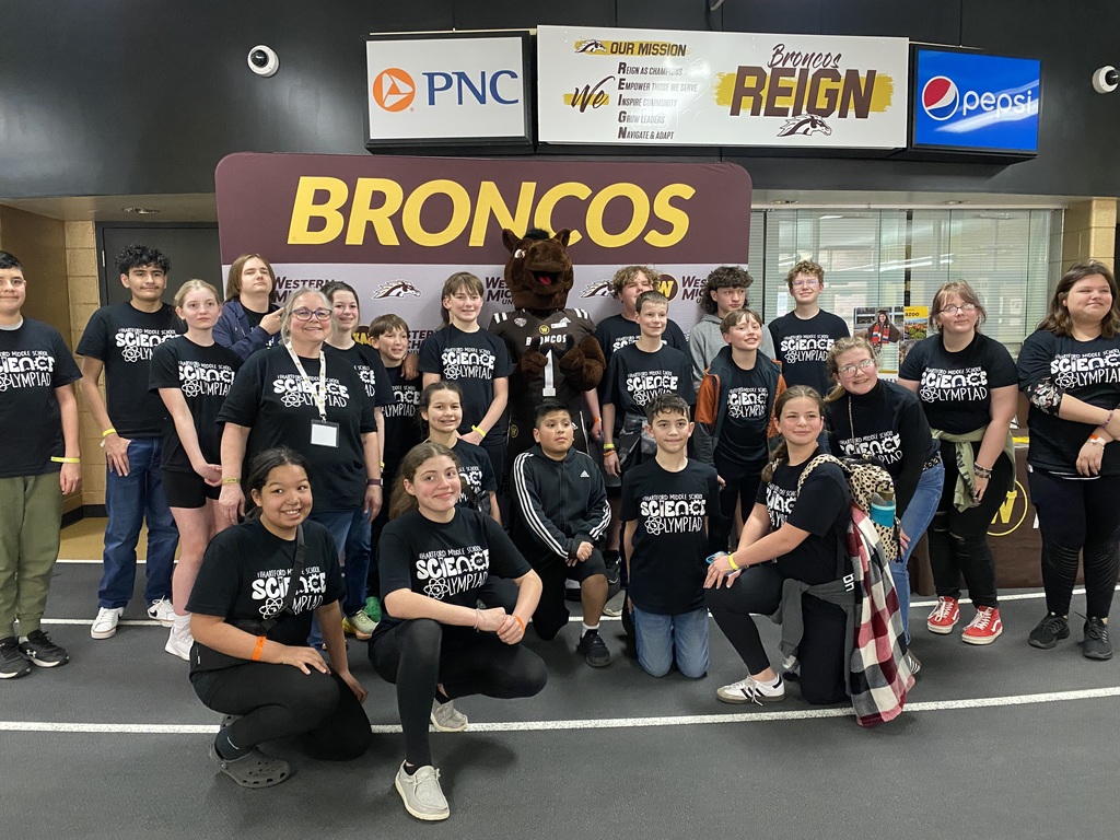 hms students pose for a group photo at the science olympiad