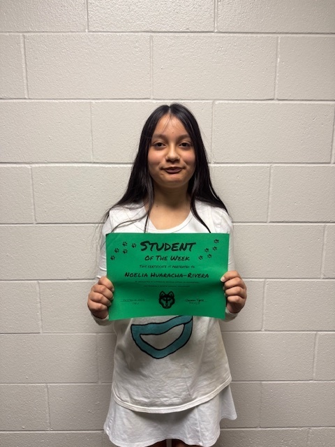  noelia holding her student  of the week sign