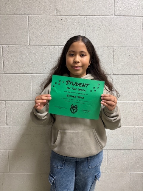 ester with her student of the week certificate