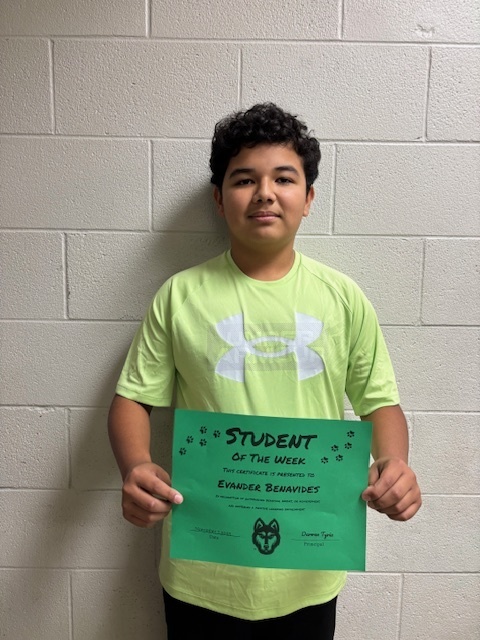 evander with his student of the week certificate