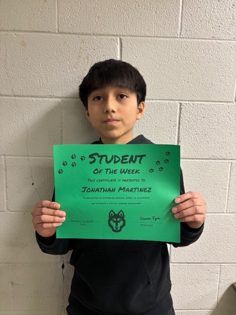 hms student jonathan martinez with his student of the week award