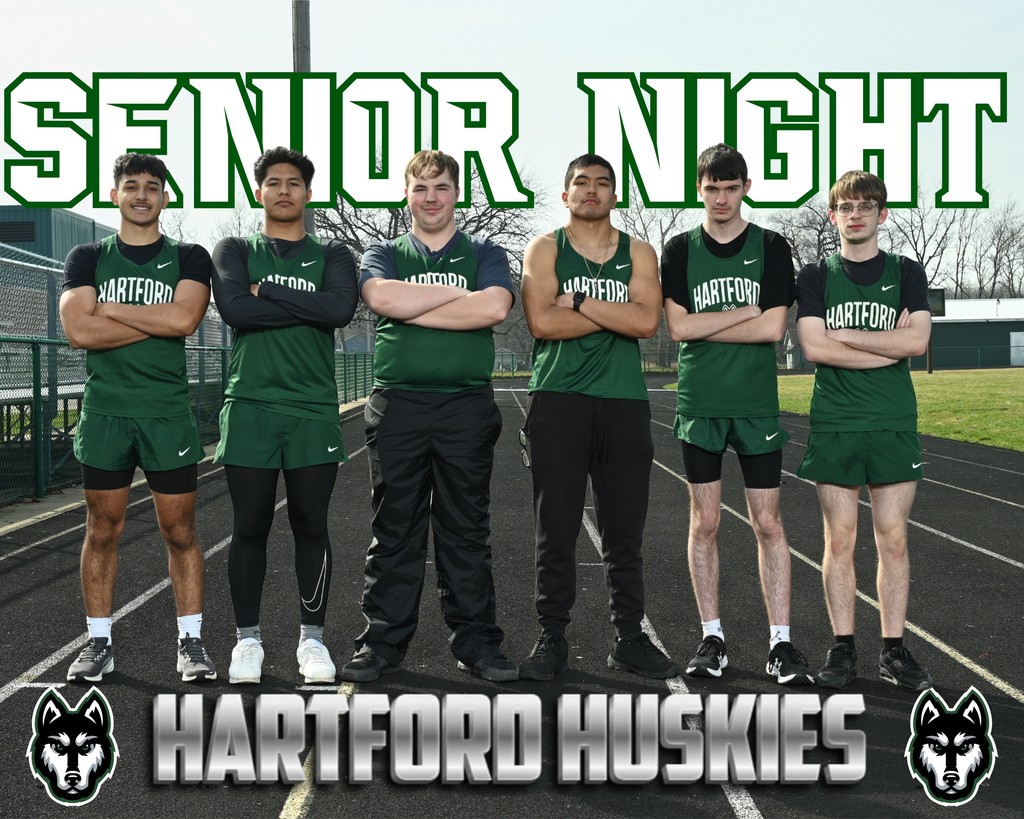 Hartford Huskies boys track seniors standing on the track with “Senior Night” and Hartford Huskies graphics.