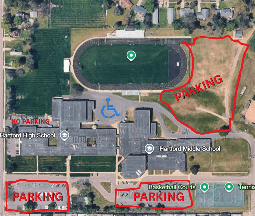 Aerial map of Hartford High School and Hartford Middle School campus showing parking instructions for the graduation ceremony. Red outlined areas labeled “PARKING” indicate available parking locations on the west side of the football field and in two parking lots south of the school buildings. A red “NO PARKING” label marks the bus loading area near the high school entrance. A blue handicap parking symbol indicates designated accessible parking near the central office area. The football field, track, tennis courts, and basketball courts are visible on the map.